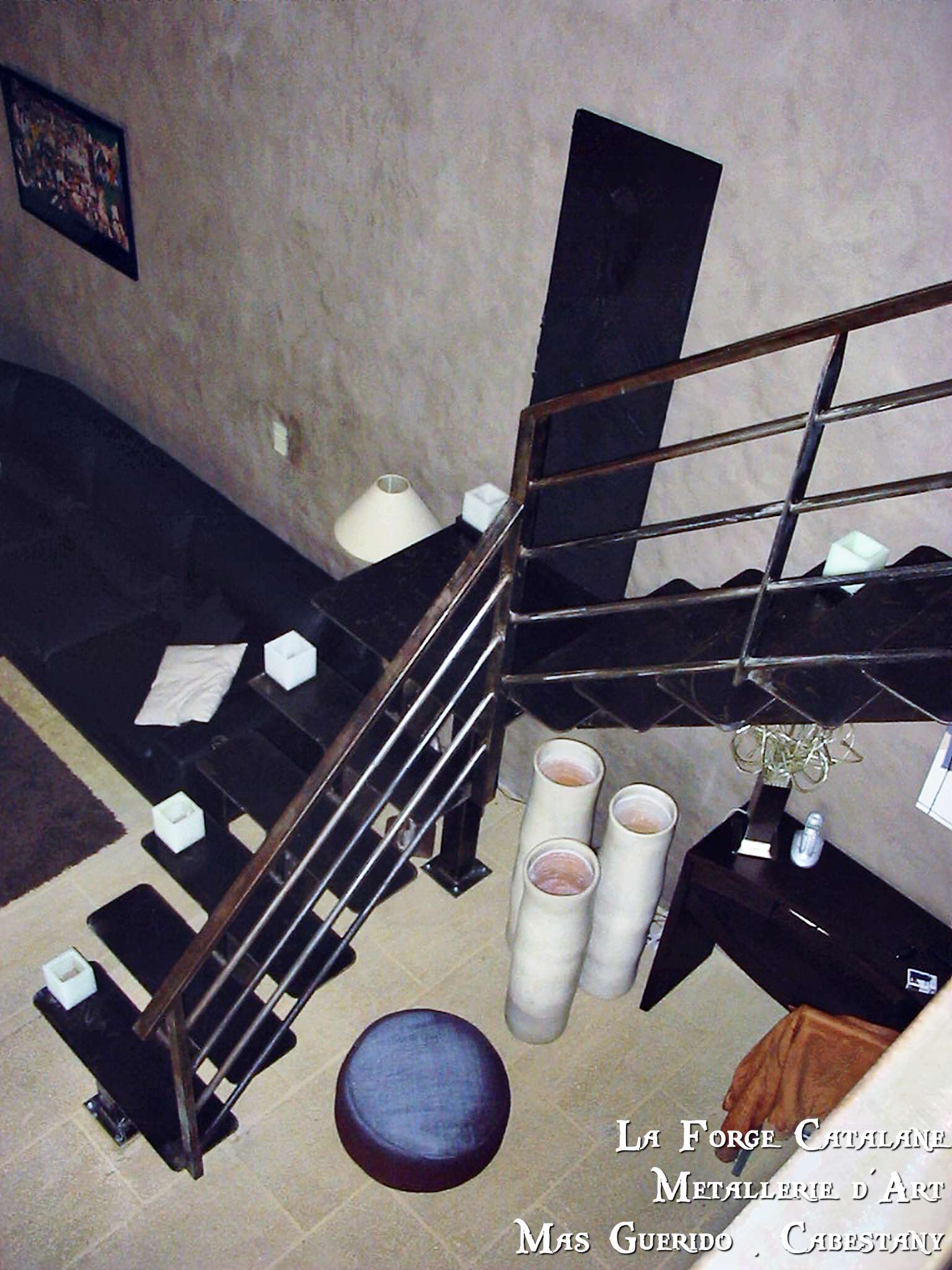 escalier limon central marches fer rampant lisses horizontales forge catalane.jpg